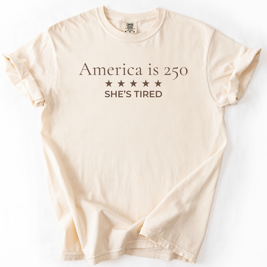 America is 250 She's Tired Democracy Humor Comfort Colors Tee